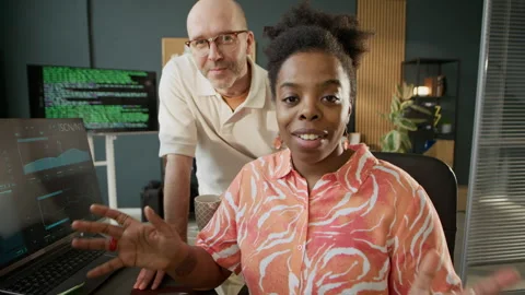 Multiethnic Programmers Recording Video Vlog in Office Stock Footage 306849464