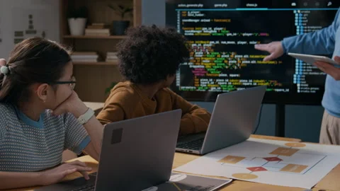 Multiethnic School Students Working on Laptops at Programming Class Stock Footage 306980353