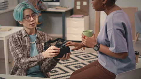 Multiethnic Software Engineers Testing VR Headset Stock Footage 241272682