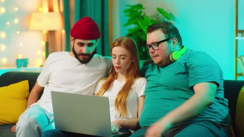 Multiethnic students working together on a college project they using laptop Stock Footage 146470856