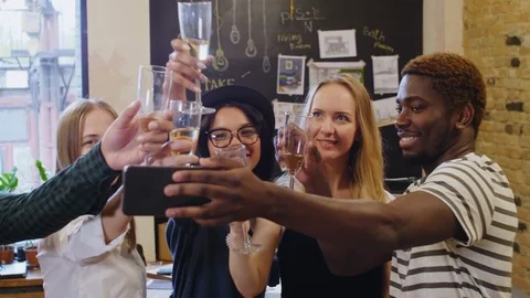 Multiethnic Team Designers Taking Selfie with Champagne Flutes at Office Party Stock Footage 115466765