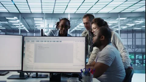 Multiethnic team of engineers working in high tech server hub, Stock Footage 319250284