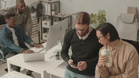 Multiethnic Team of Programmers Coworking in Office Video stock 165720443