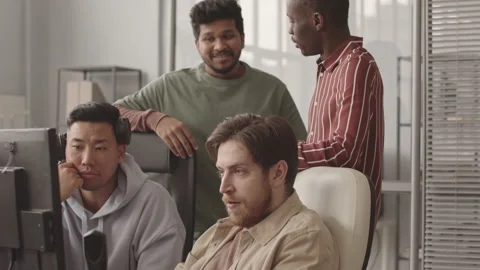 Multiethnic Team of Programmers Coworking in Office Stock Footage 172192658