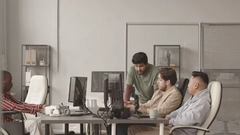 Multiethnic Team of Video Game Developers Working in Office Video stock 172192455