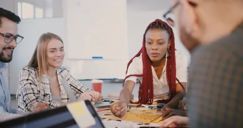 Multiethnic teamwork at healthy workplace. Experienced young black female leader Stock Footage 107383561