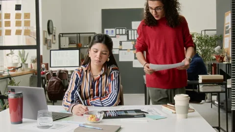 Multiethnic UX Designers Discussing Ideas for New Wireframe Concept Stock Footage 327906417