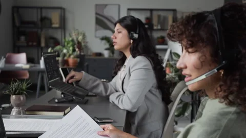 Multiethnic Women Working in Customer Support Call Center Stock Footage 343612171
