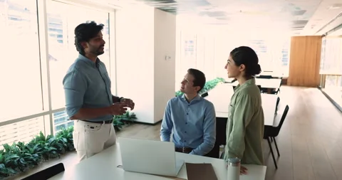 Multiethnic workers feel satisfied giving high five gesture Stock Footage 266641379