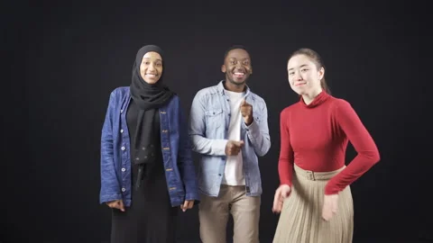 Multiethnic young people dancing. A group of multiethnic friends dancing. 動画素材 228850119