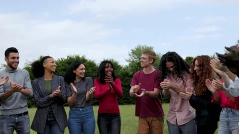 Multiethnic young people having fun celebrating together outdoor Stock Footage 197376915