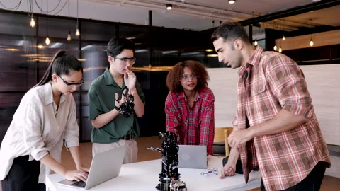Multiethnic young students listen to teacher about technology robotics mech.. Stock Footage 246748669