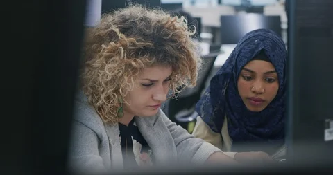 Multiethnics business team of software developers programming together using  Stock Footage 113941332