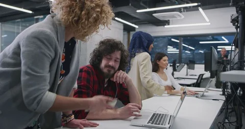 Multiethnics business team of software developers programming together using  Stock Footage 113941915