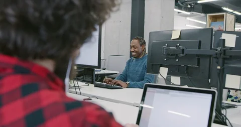 Multiethnics business team of software developers programming together using  Stock Footage 114080536