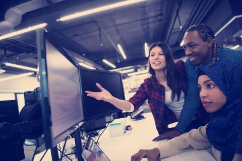 Multiethnics team of software developers working together 스톡 사진