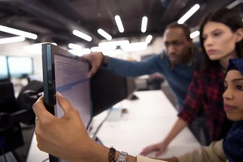 Multiethnics team of software developers working together 스톡 사진