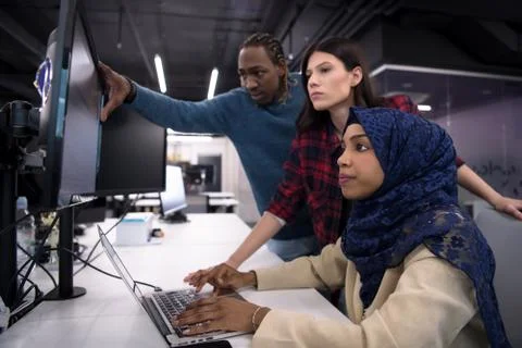 Multiethnics team of software developers working together 스톡 사진