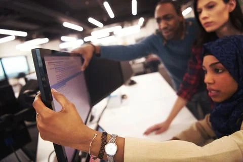 Multiethnics team of software developers working together 스톡 사진