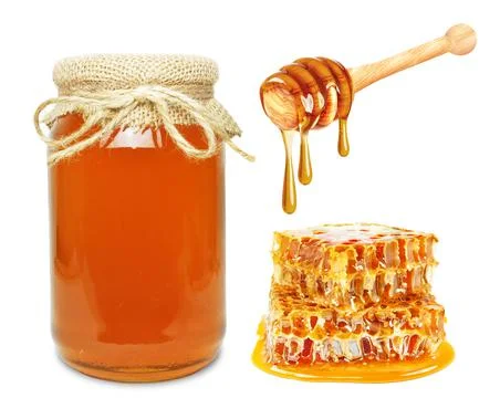 Multiflorous honey in a jar Stock Photos