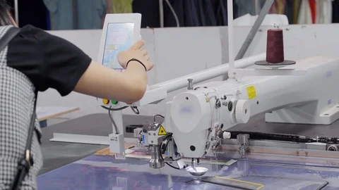 A multifunction automatic machine for cutting and sewing cloth for dressmaking Stock Footage 89706550