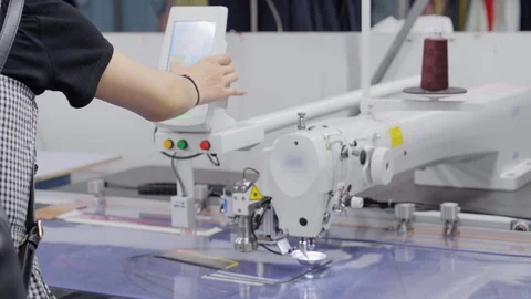 A multifunction automatic machine for cutting and sewing cloth for dressmaking Stock Footage 89706693