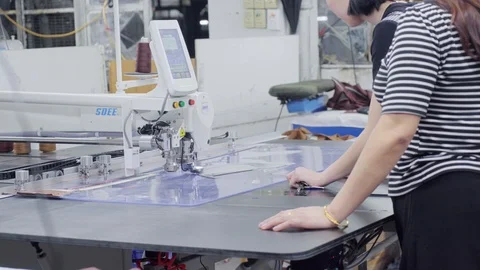 A multifunction automatic machine for cutting and sewing cloth for dressmaking Stock Footage 89706858