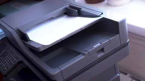 Multifunctional device. scanning images from sheets of paper Stock Footage 170742970