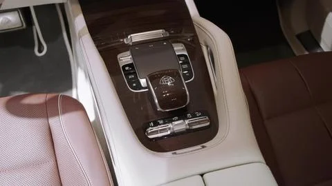 Multifunctional joystick to control various functions on central console in car Stock Photos