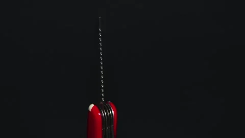 Multifunctional red pocket knife rotates 360 degrees, 4k Stock Footage 248619829