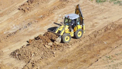 Multifunctional tractor-excavator Stock Footage 111946336