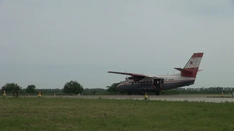 Multifunctional twin-engine turbojet engine L-410 taxis in direction of start. Stock Footage 121203408