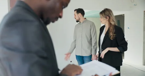 Multigenerational Living agent introduces multigenerational family to house with Stock Footage 277679031