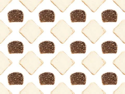 Multigrain bread slices and toasts with butter pattern on white Foto stock