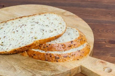 Multigrain bread on a wooden background Stock Photos