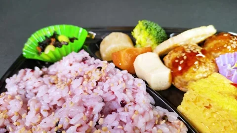 Multigrain rice bento close up, rotating Stock Footage 308835522