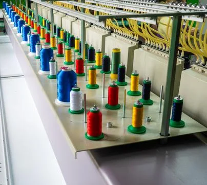 Multihead Industrial Embroidery Machine Loaded with Colorful Thread Spools Stock Photos