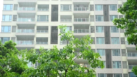 Multilayered building in a raining day at horizontal composition Stock Footage 244815659