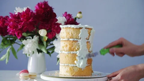 Multilayered party cake preparation process. Stock Footage 105448101