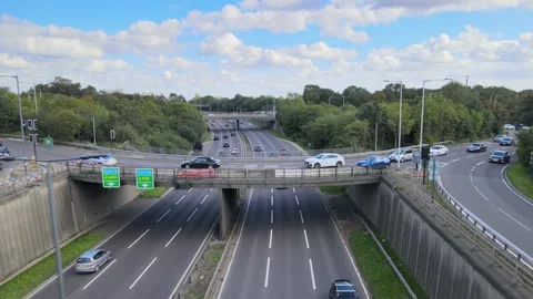 Multilevel crossroad surrounded by green trees and shrubs Stock-Footage 164828127