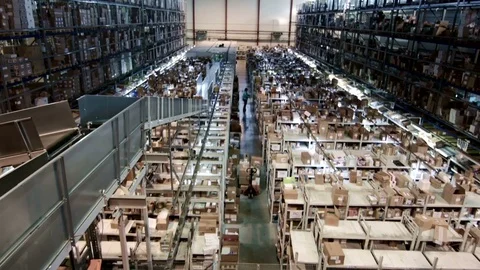 Multilevel warehouse with cardboard boxes arranged on the racks, pharmaceutical Stock Footage 74224758