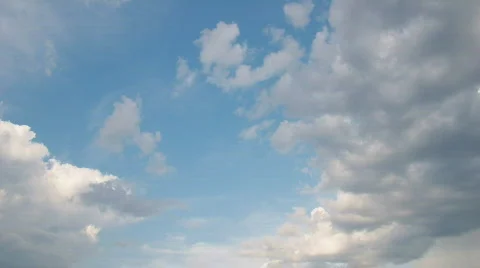 Multilevel white floating clouds on blue sky - motion background Stock Footage