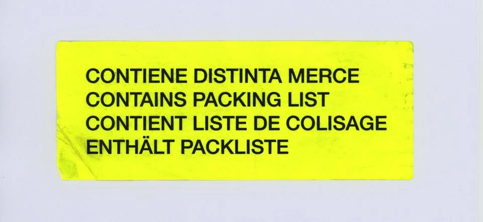 Multilingual contains packing list label Stock Photos