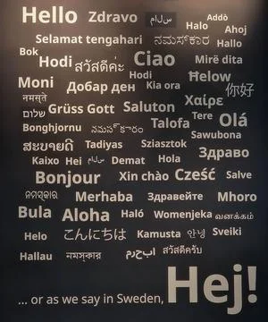 Multilingual Hello Greetings Wall Display with Swedish Accent Stock Photos