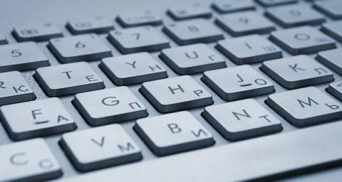 Multilingual keyboard close up Stock Photos
