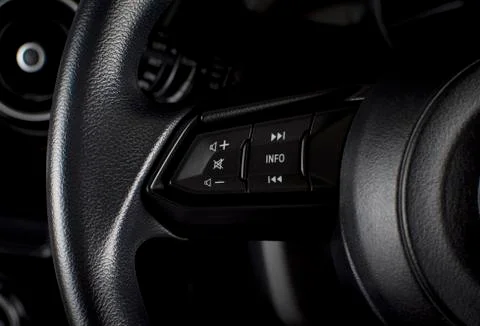 Multimedia button on steering wheel. Stock Photos