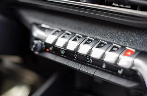 Multimedia control console and climate in a modern car. close-up, selective Stock Photos