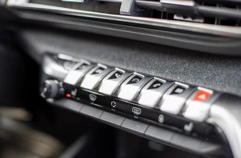 Multimedia control console and climate in a modern car. close-up, selective Stock Photos