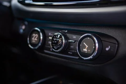 Multimedia control console and climate in a modern car. close-up, selective Stock Photos