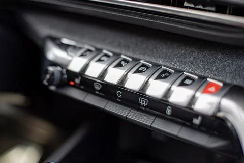 Multimedia control console and climate in a modern car. close-up, selective Stock Photos
